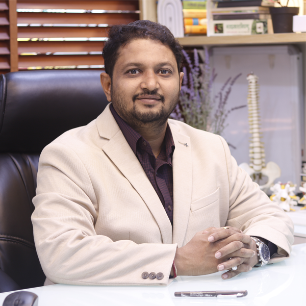 Dr. Kalpesh Mande